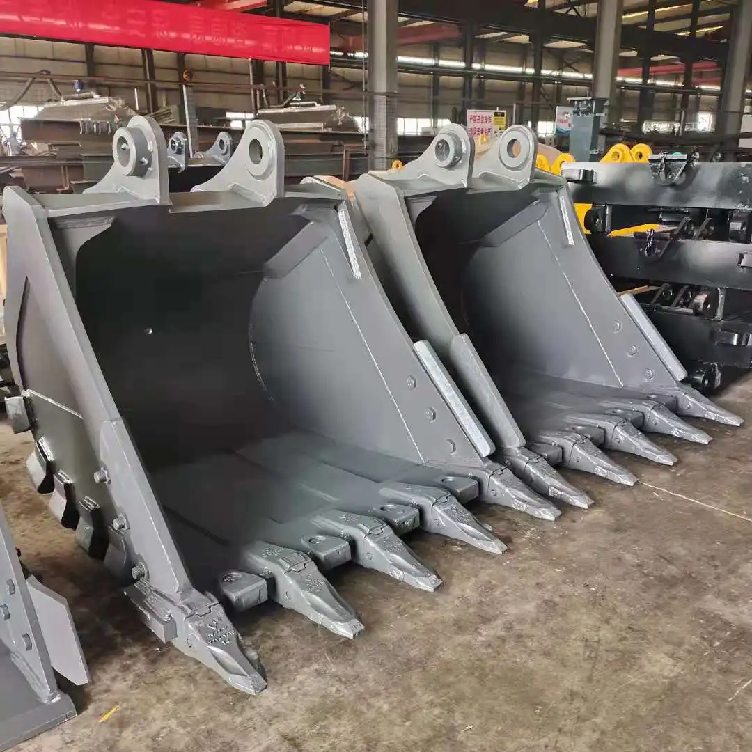 What is the difference between an excavator and a backhoe attachment?
